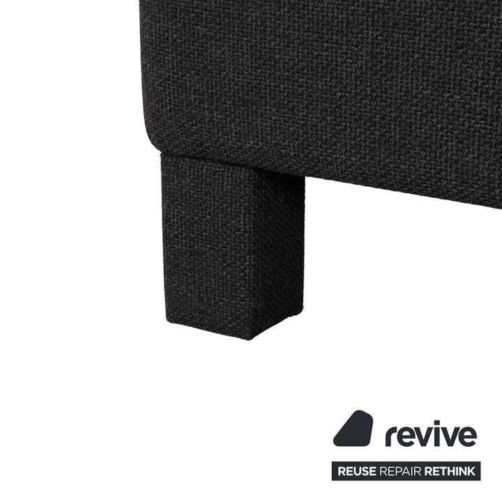 Canapé d'angle COR Conseta en tissu gris foncé avec pouf