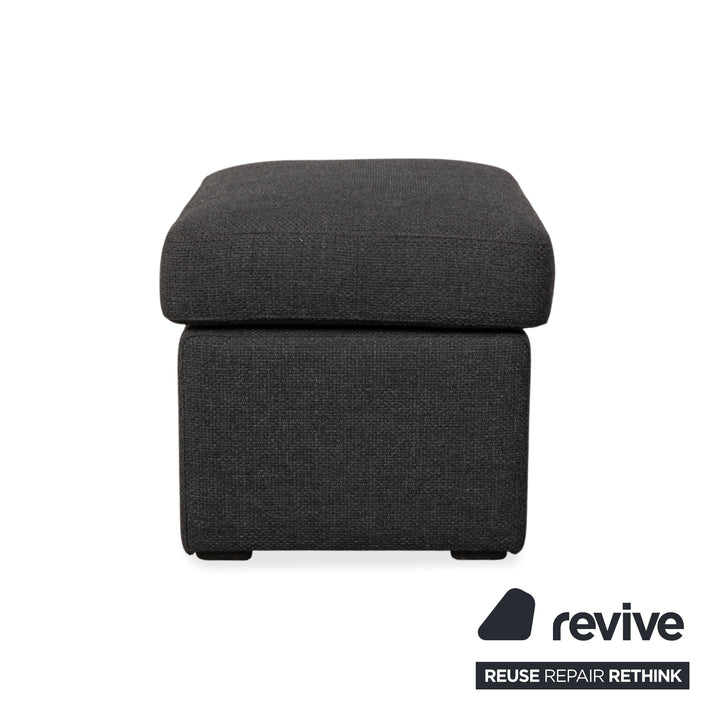 Canapé d'angle COR Conseta en tissu gris foncé avec pouf
