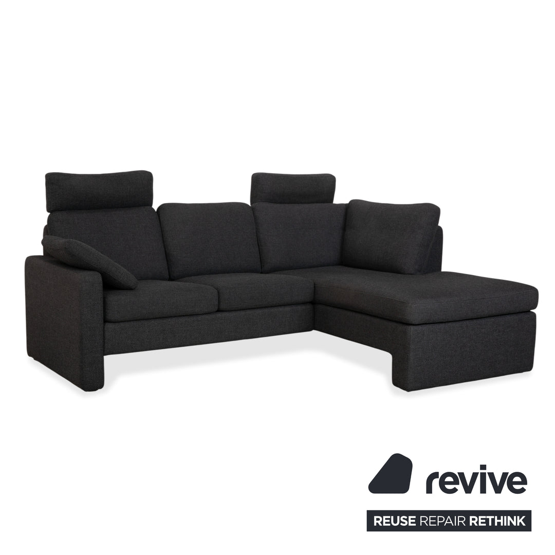 Canapé d'angle COR Conseta en tissu gris foncé avec pouf