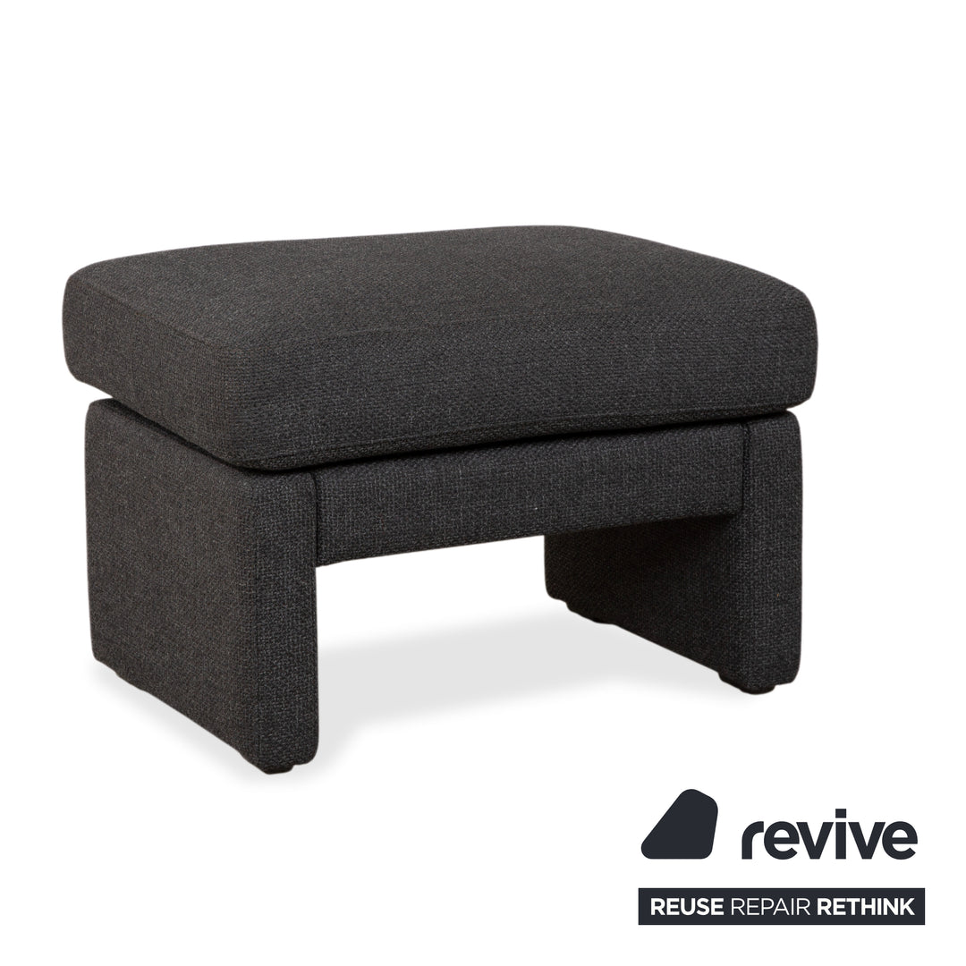 Canapé d'angle COR Conseta en tissu gris foncé avec pouf