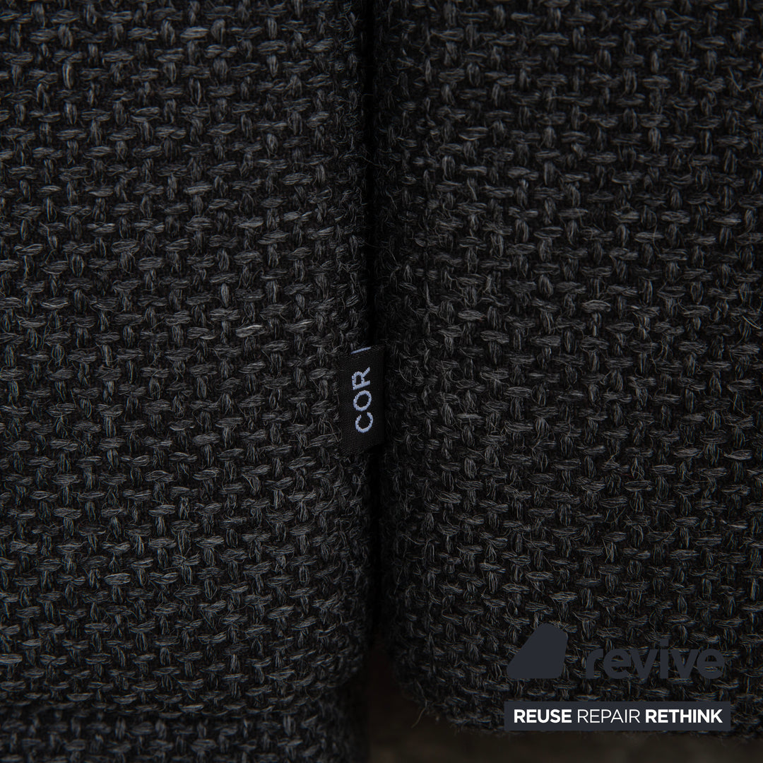 Canapé d'angle COR Conseta en tissu gris foncé avec pouf