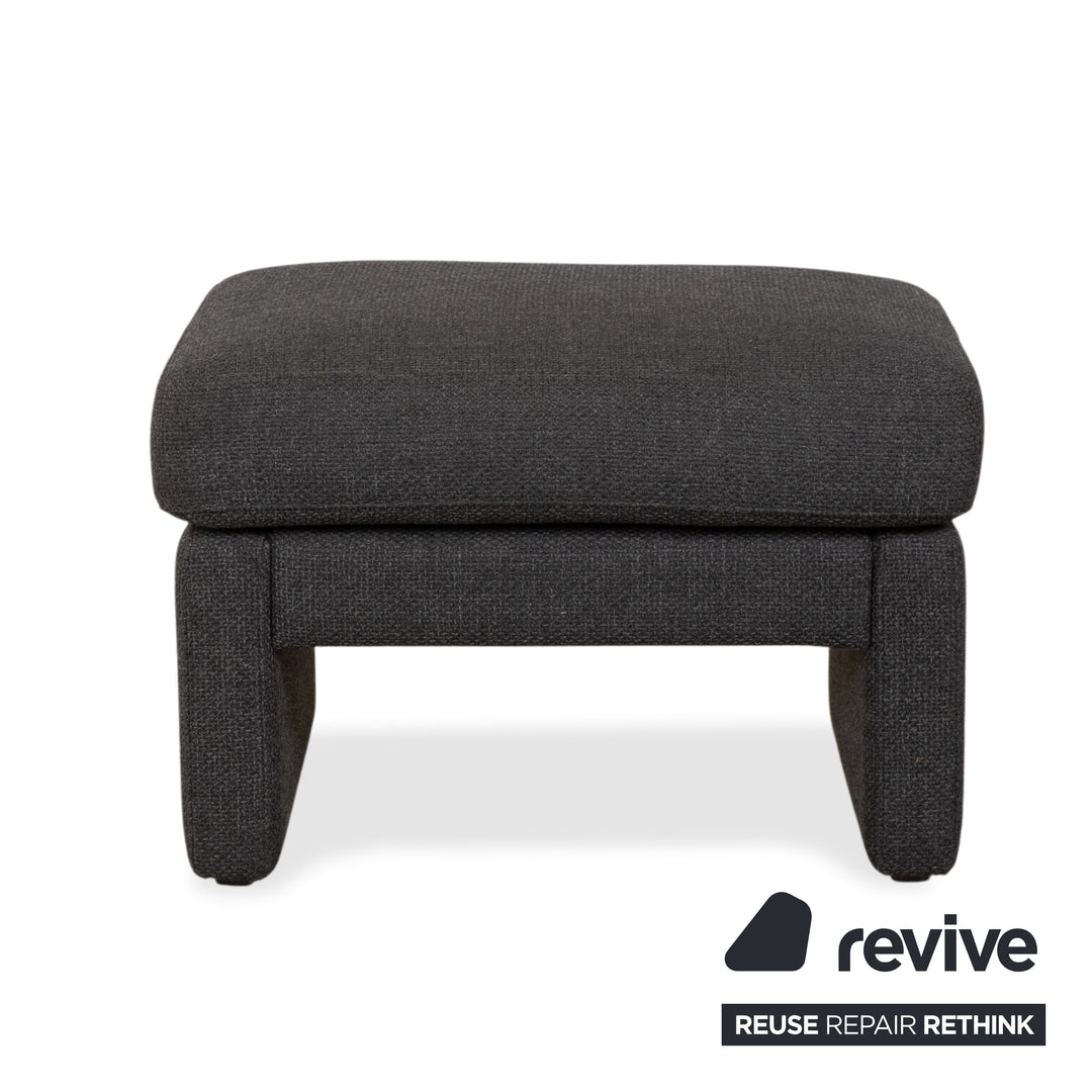 Canapé d'angle COR Conseta en tissu gris foncé avec pouf