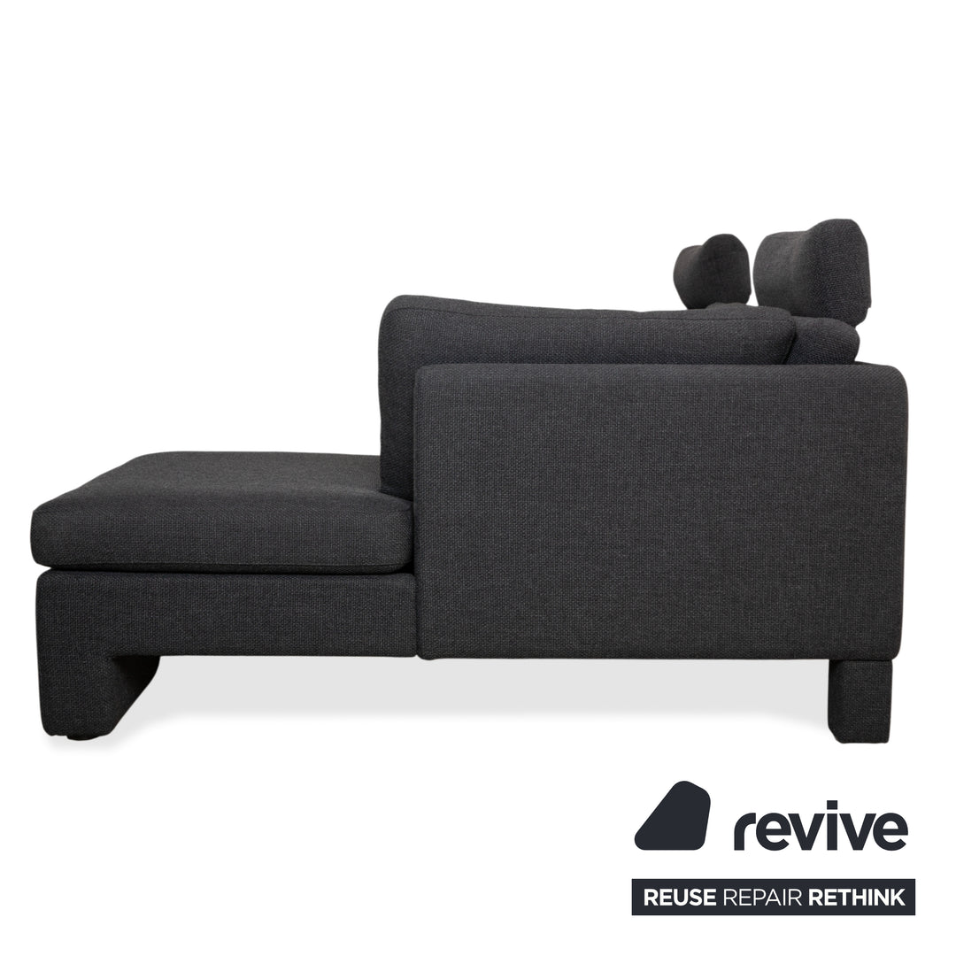 Canapé d'angle COR Conseta en tissu gris foncé avec pouf
