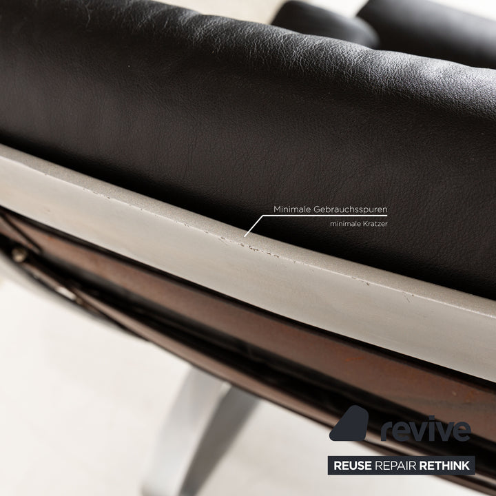 Fauteuil en cuir Cor Sinus noir avec tabouret