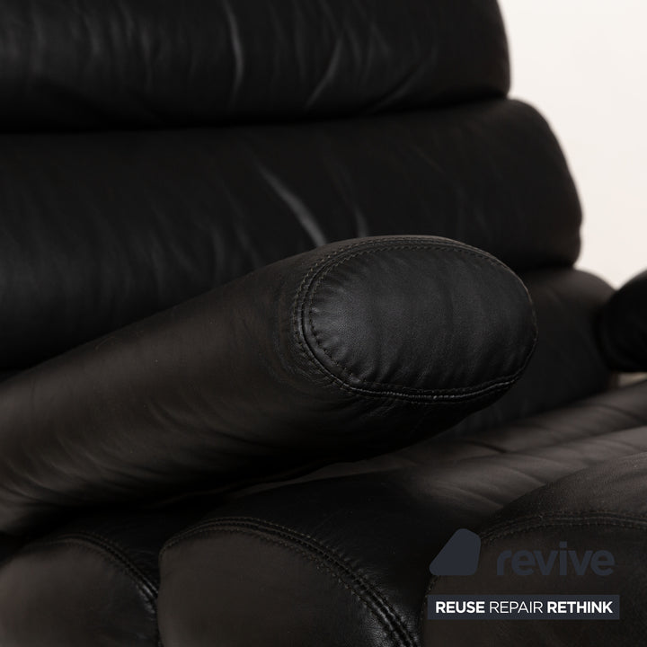 Fauteuil en cuir Cor Sinus noir avec tabouret
