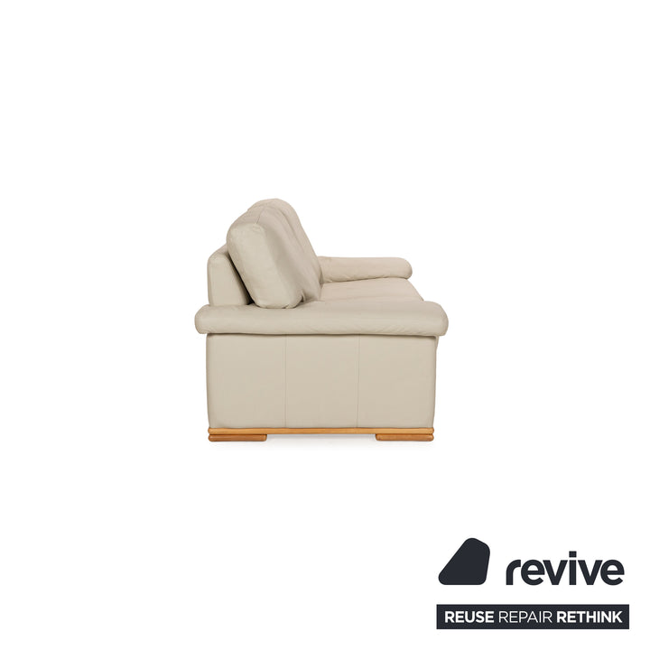 Canapé deux places en cuir beige
