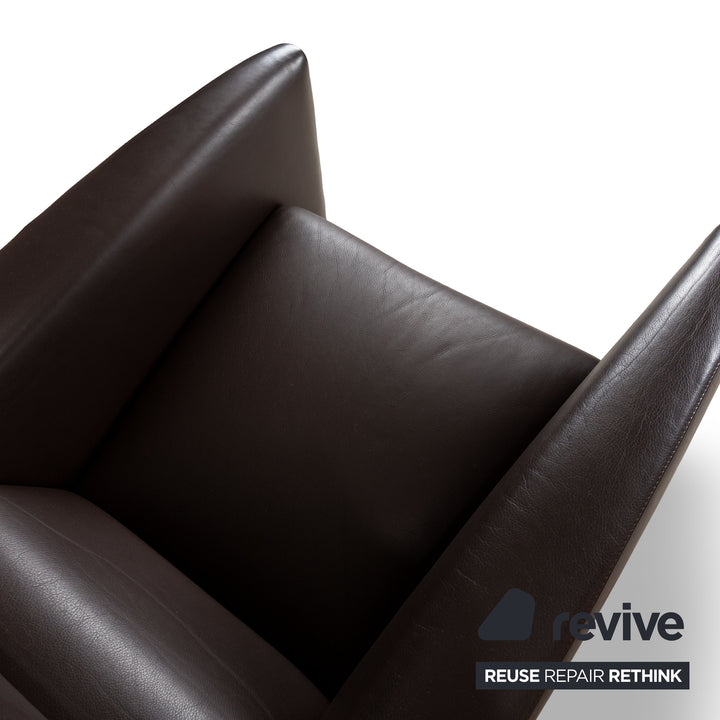 Fauteuil en cuir Leolux Oblomov marron avec tabouret