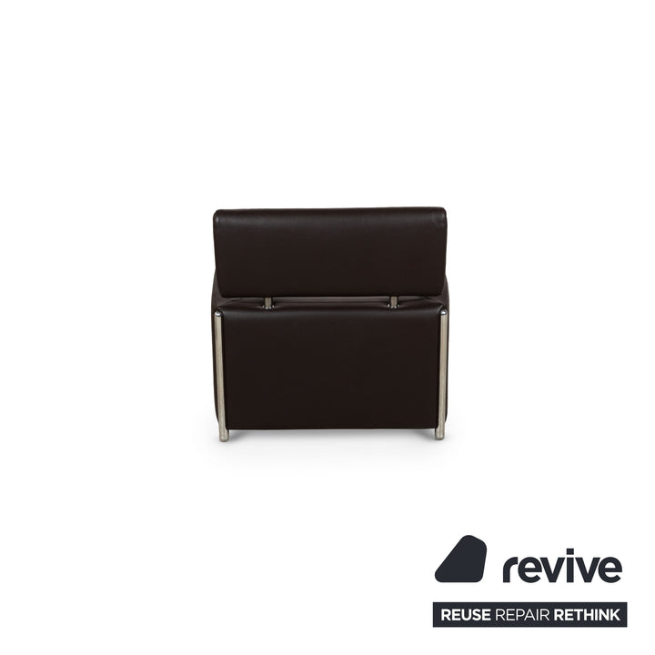 Fauteuil en cuir Leolux Oblomov marron avec tabouret