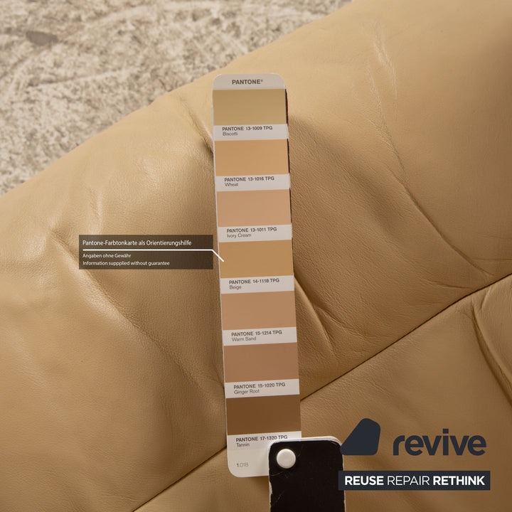 Fauteuil en cuir Stressless Reno beige avec tabouret