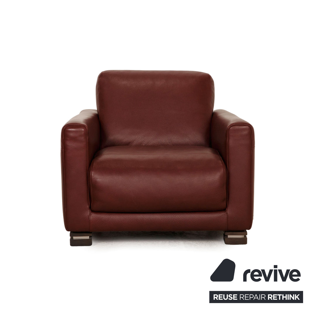 Fauteuil Natuzzi en cuir rouge